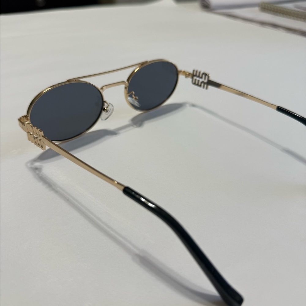 Gold Oval Sunglasses with Black Lenses